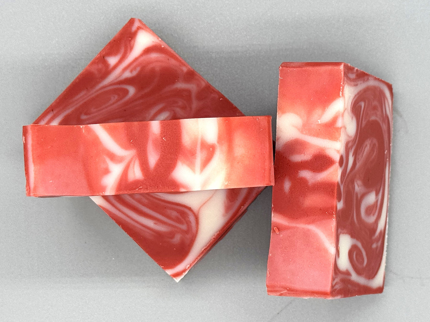 Handmade Candy Cane Bar Soap - tallow-based Christmas soap with red and white swirls-3 bar top view
