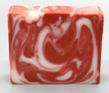 Handmade Candy Cane Bar Soap - tallow-based Christmas soap with red and white swirls-front view