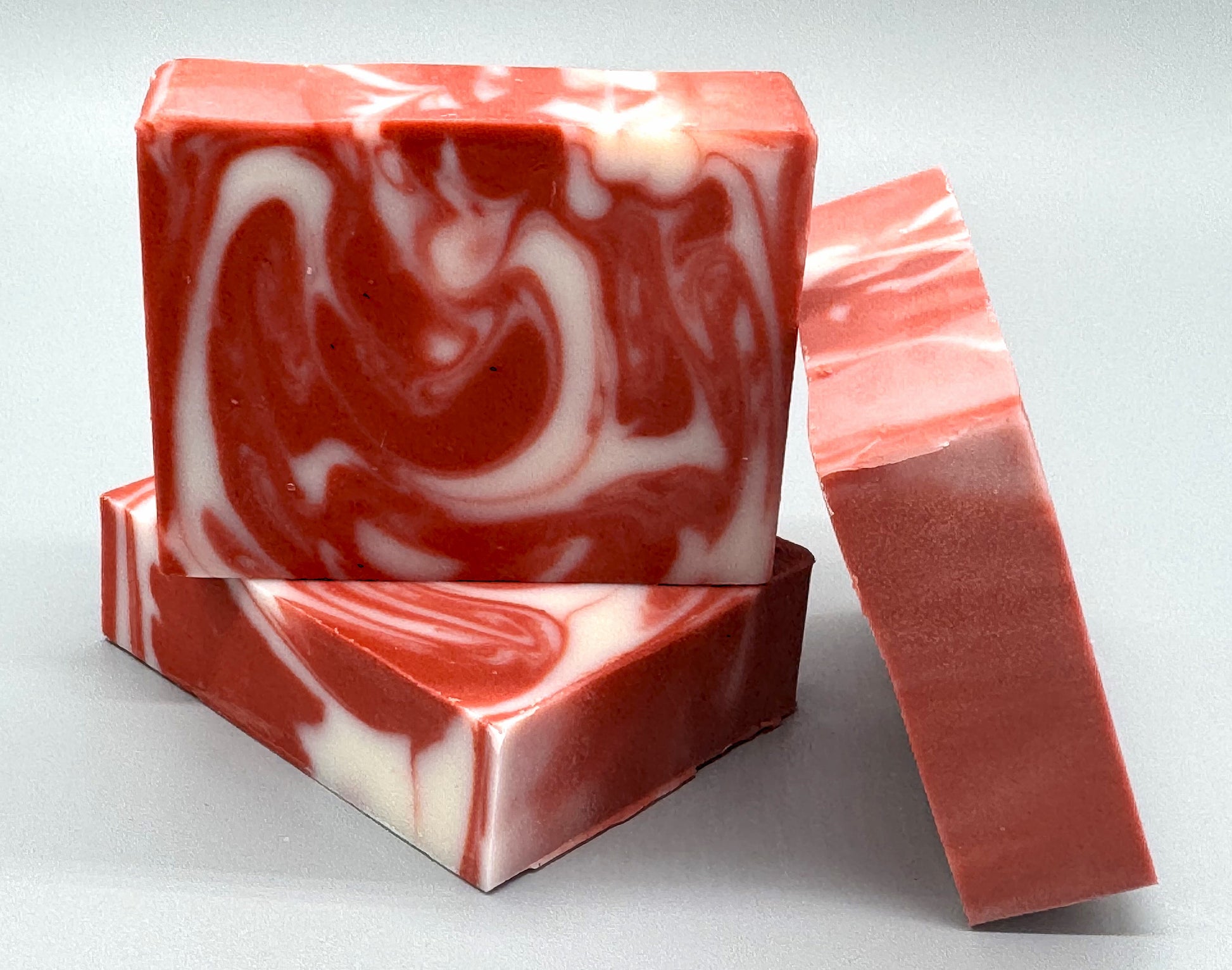 Handmade Candy Cane Bar Soap - tallow-based Christmas soap with red and white swirls-3 bar front view