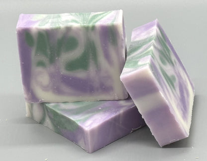 Handmade Lavender Rosemary Bar Soap – tallow-based soap scented with essential oils, purple and green swirls on white background-3 bar front view