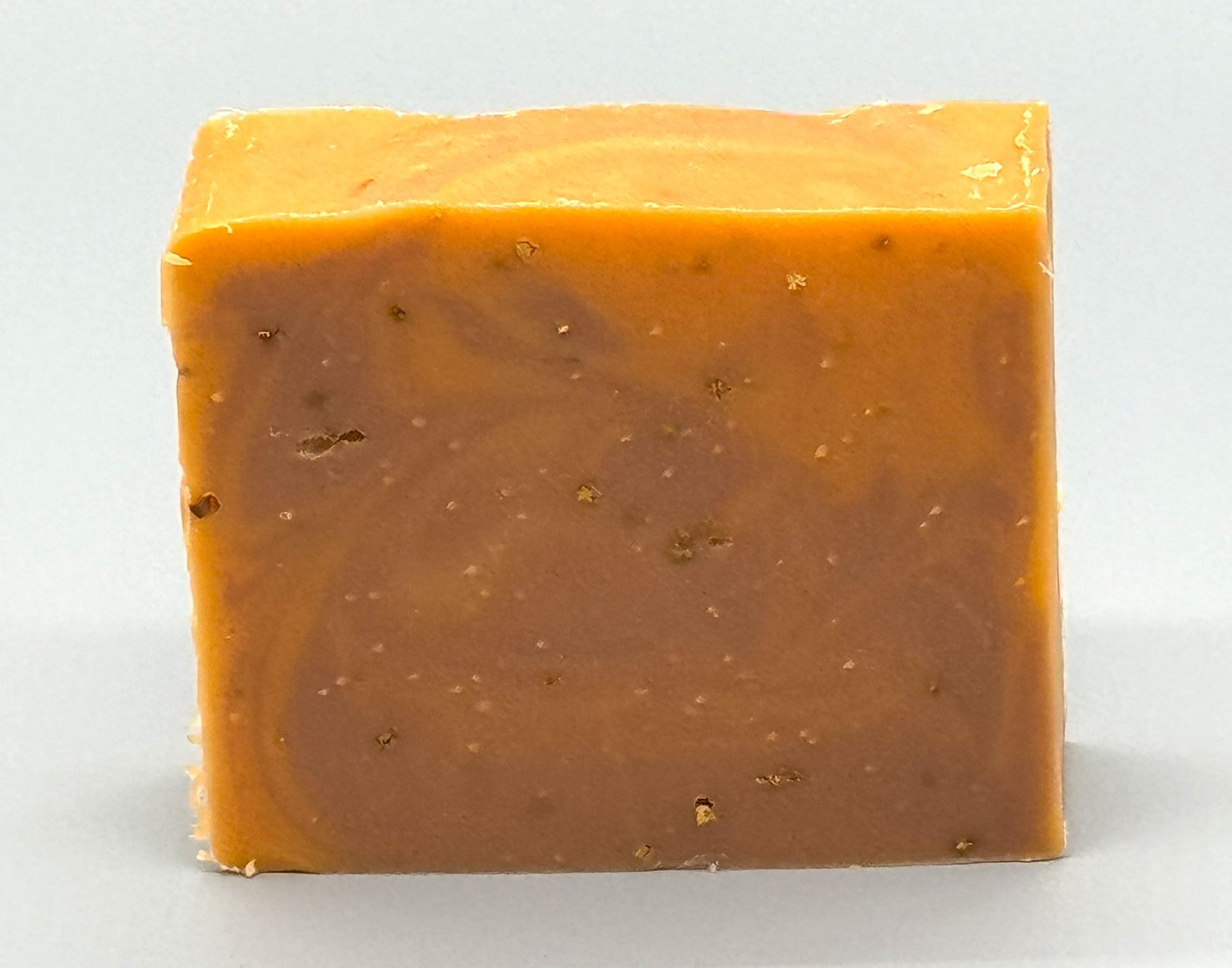 Handmade Orange Spice Bar Soap – tallow-based soap with cinnamon, nutmeg, and dried orange peel for gentle exfoliation-front view