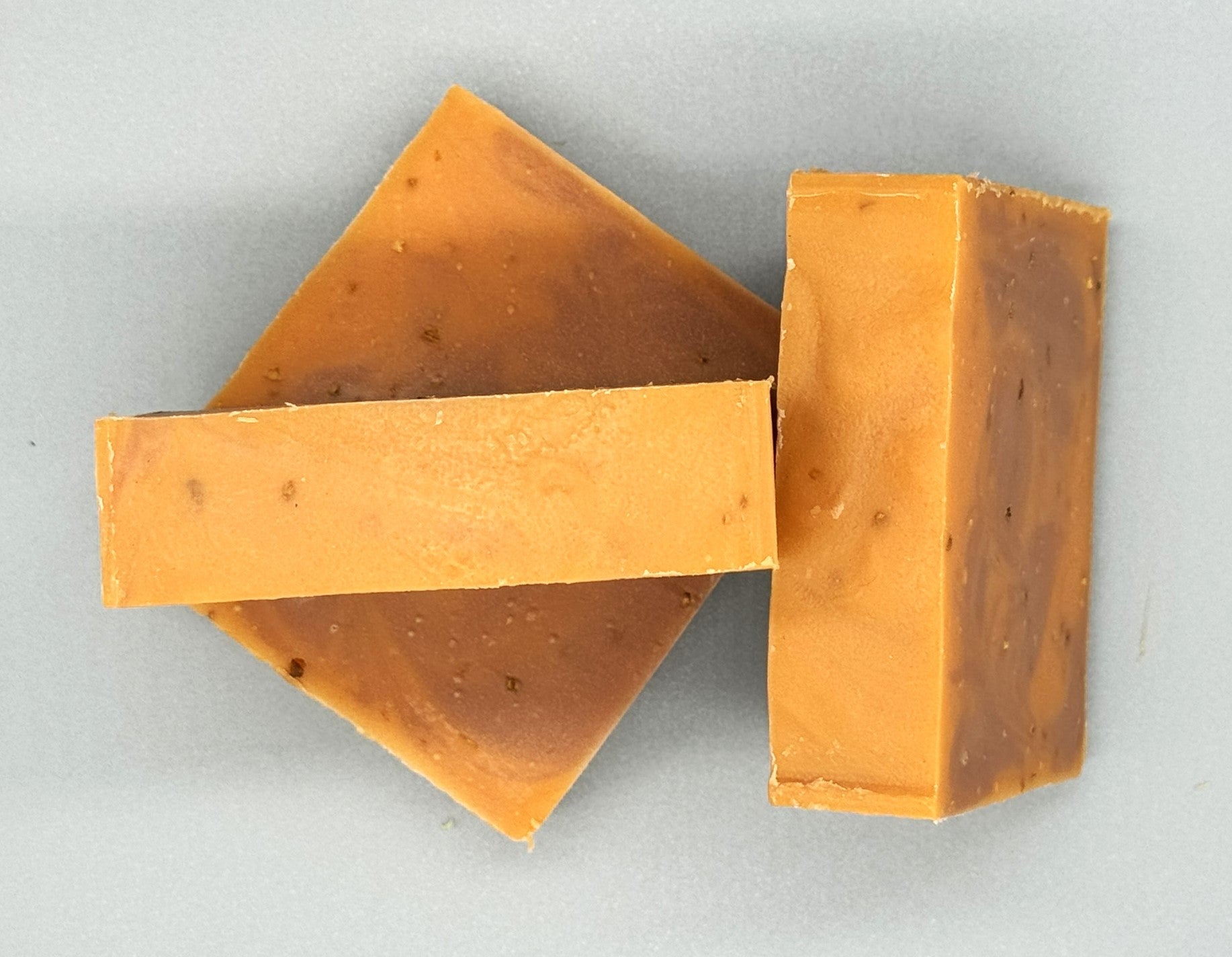 Handmade Orange Spice Bar Soap – tallow-based soap with cinnamon, nutmeg, and dried orange peel for gentle exfoliation-3 bar top view