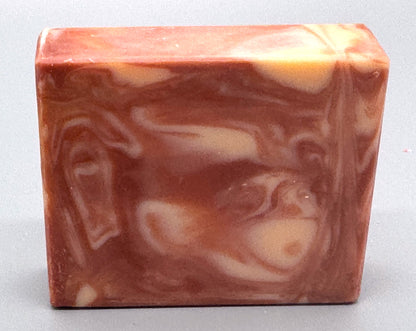 Handmade tallow bar soap with pink and cream swirls, scented with bright pink grapefruit fragrance