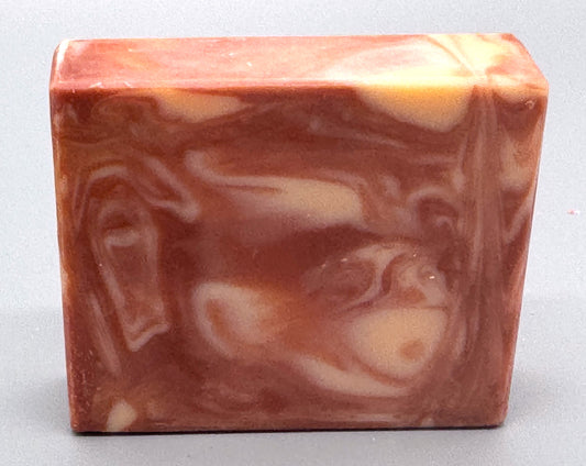 Handmade tallow bar soap with pink and cream swirls, scented with bright pink grapefruit fragrance