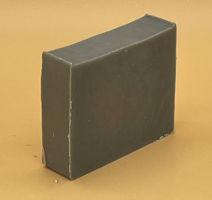 Sandalwood Bergamot Bar Soap at an angle by Talley’s Soap Co — handmade tallow soap with Steel Works gray color, rustic and natural style.