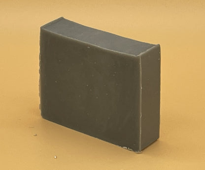 Sandalwood Bergamot Bar Soap at an angle by Talley’s Soap Co — handmade tallow soap with Steel Works gray color, rustic and natural style.